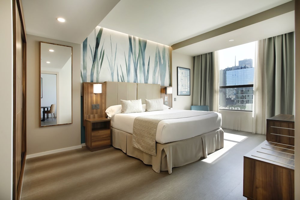 Suite Deluxe, 1 cama de matrimonio grande con sofá cama del hotel Riu Plaza Chicago. Foto 2