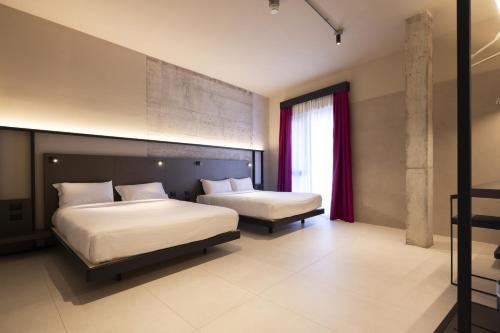 Habitación Cuádruple del hotel Joy 124 Milano