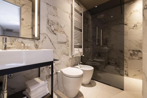 Habitación Cuádruple del hotel Joy 124 Milano. Foto 1