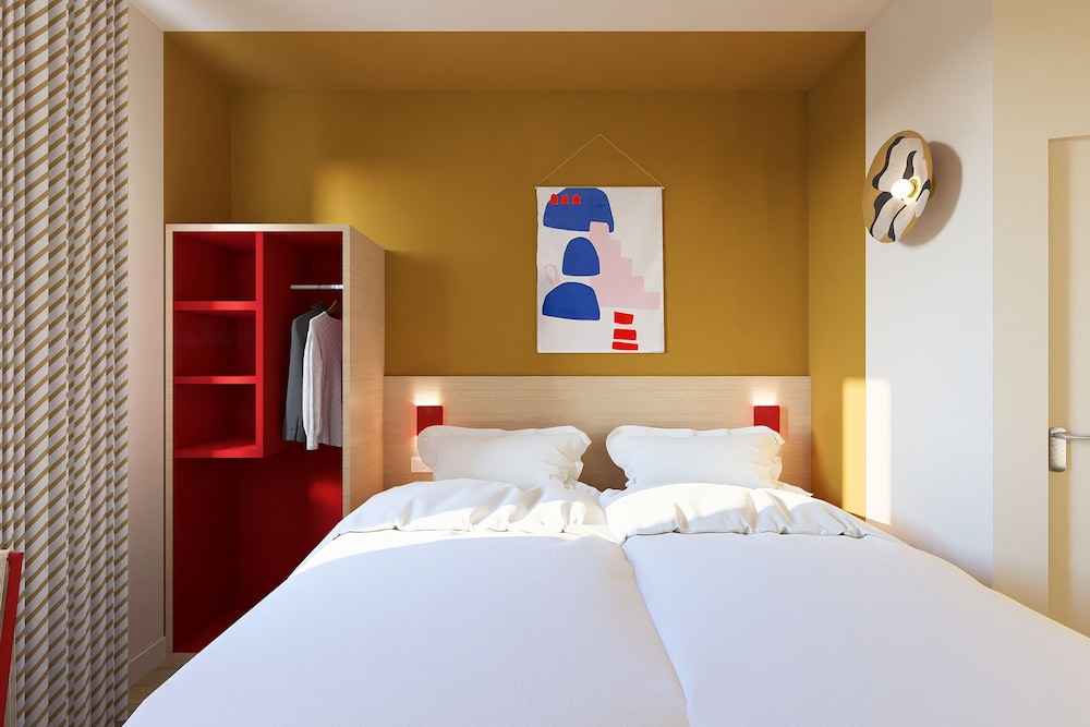 Habitación Standard con 2 camas individuales del hotel Ibis Styles Prévessin Genève Aéroport. Foto 3