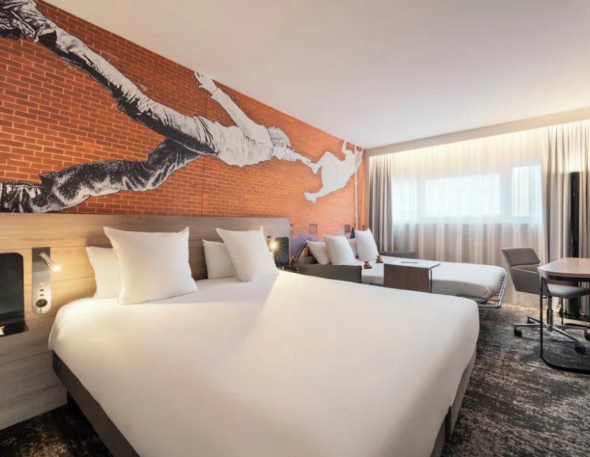 Habitación doble 1 Cama king Sofá Cama incluido del hotel Novotel Paris La Défense Nanterre. Foto 1