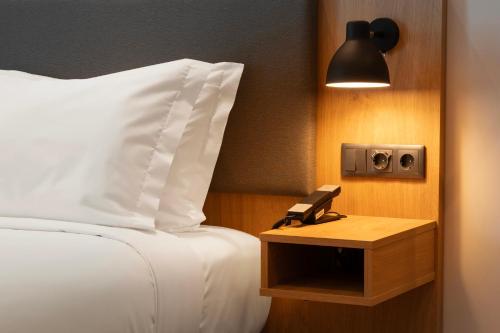 Habitación Doble Premium con sofá cama - 2 camas del hotel Holiday Inn Braga, an IHG. Foto 5