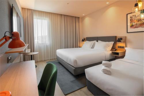 Premium Queen Room with Balcony and Pool View - Accessible del hotel Holiday Inn Braga, an IHG. Foto 1