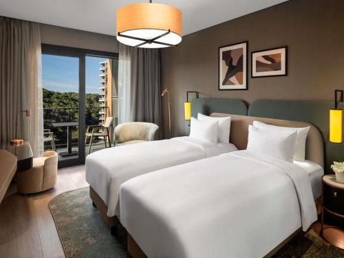 Superior One - Bedroom Apartment with Twin Beds del hotel Mövenpick Living Istanbul Saklivadi. Foto 2