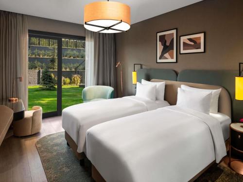 Superior One - Bedroom Apartment with Twin Beds del hotel Mövenpick Living Istanbul Saklivadi. Foto 5