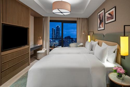 Superior One - Bedroom Apartment with Twin Beds del hotel Mövenpick Living Istanbul Saklivadi. Foto 8
