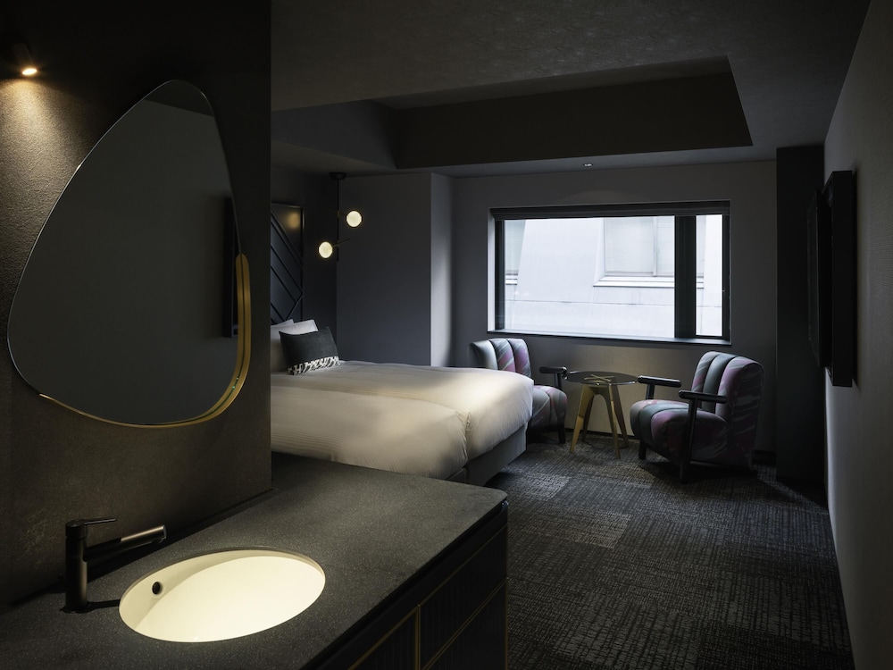 Habitación Deluxe con 2 camas individuales (with Washing Machine) del hotel Mercure Tokyu Stay Osaka Namba. Foto 9