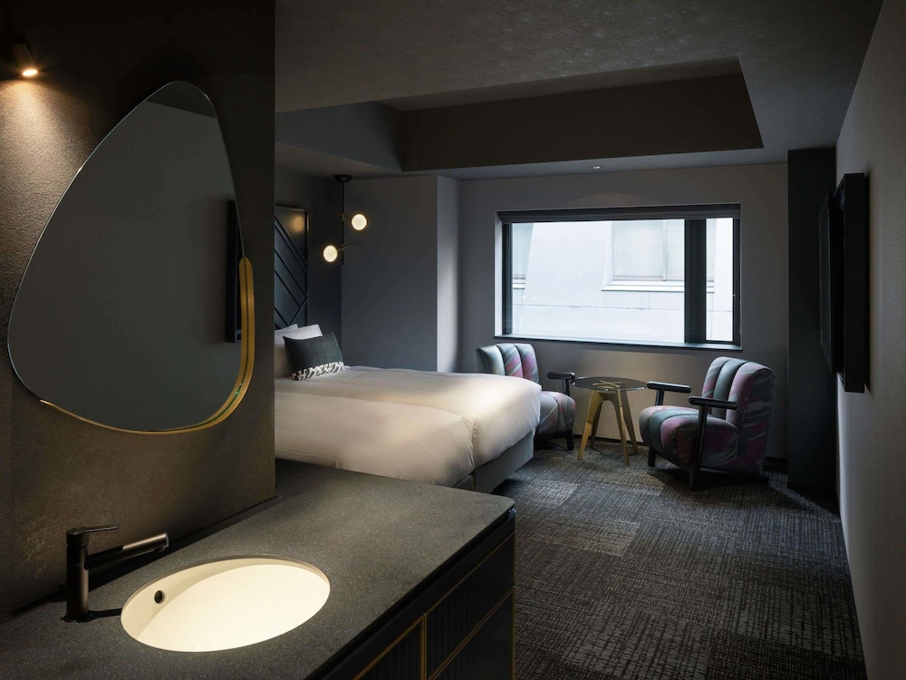 Habitación Deluxe con 2 camas individuales (with Washing Machine) del hotel Mercure Tokyu Stay Osaka Namba. Foto 12