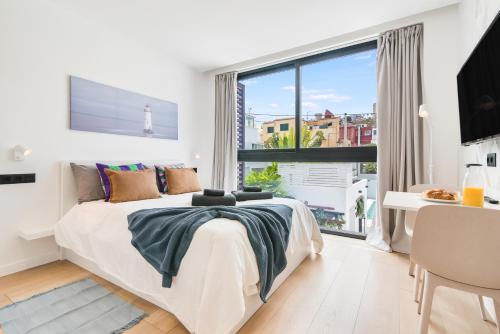 Habitación Doble con baño privado del hotel La Vega de Ciudad Jardín Suites. Foto 1