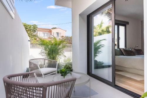 Habitación Doble del hotel La Vega de Ciudad Jardín Suites. Foto 3