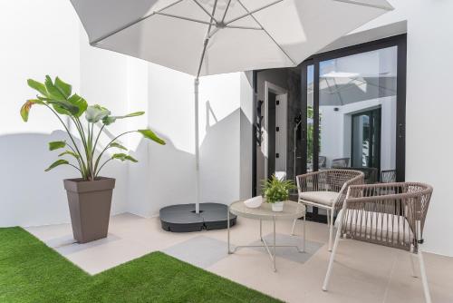 Habitación Deluxe del hotel La Vega de Ciudad Jardín Suites. Foto 4