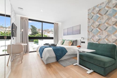 Habitación Triple con baño privado del hotel La Vega de Ciudad Jardín Suites