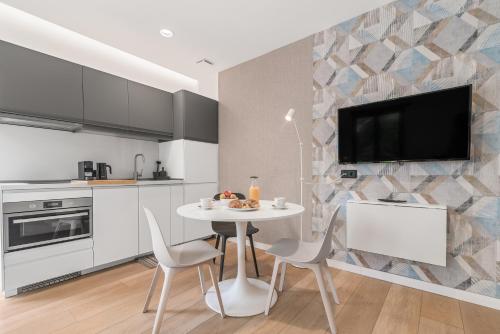 Habitación Doble Deluxe del hotel La Vega de Ciudad Jardín Suites. Foto 7