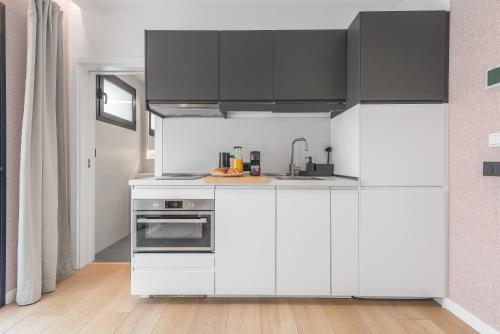 Habitación Triple Deluxe del hotel La Vega de Ciudad Jardín Suites. Foto 6