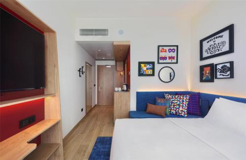 Habitación con sofá cama - 1 cama grande del hotel Hampton By Hilton Venice Isola Nuova. Foto 5