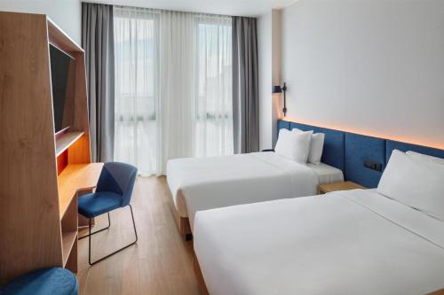 Habitación Doble - 2 camas del hotel Hampton By Hilton Venice Isola Nuova. Foto 3