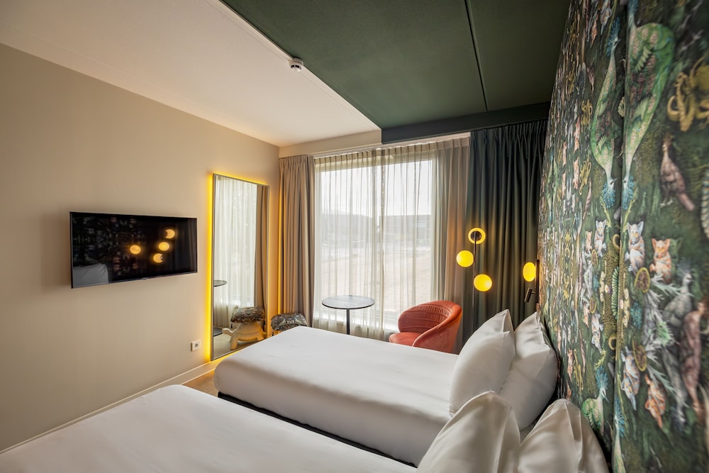 Habitación estándar con 2 camas individuales del hotel Ibis Styles Rotterdam Ahoy. Foto 2