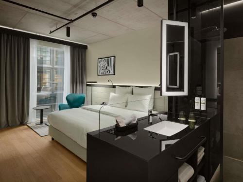 Habitación Superior con cama king size del hotel Pullman Zagreb. Foto 4