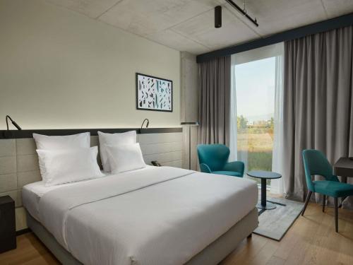 Habitación Superior con cama king size del hotel Pullman Zagreb. Foto 5