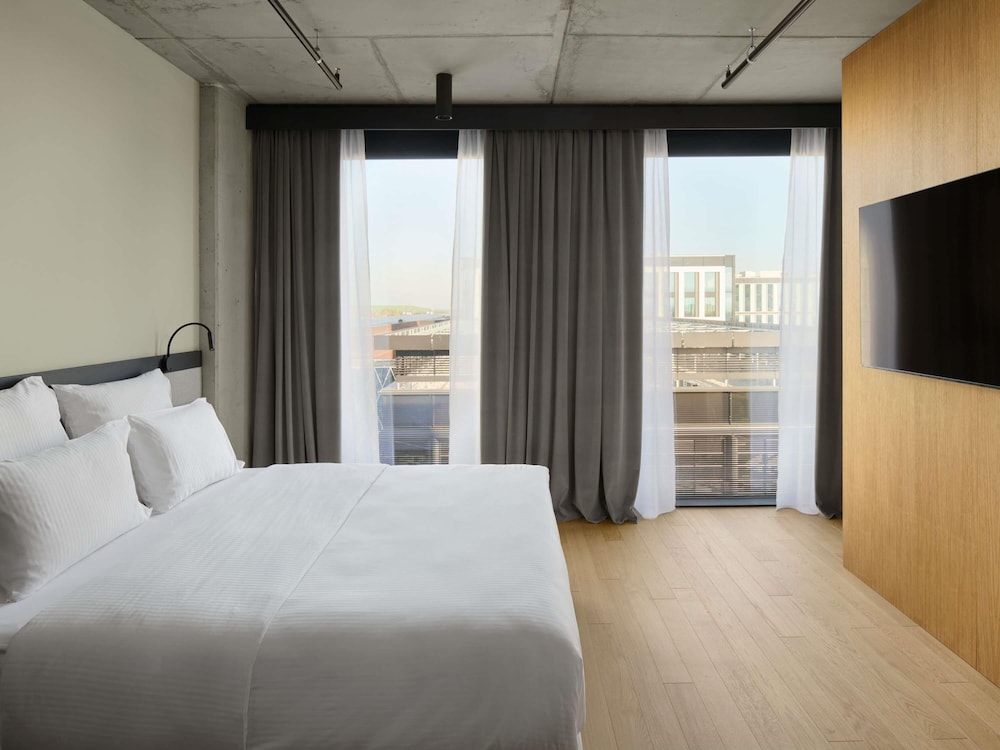 Junior suite Lujo 1 Cama king del hotel Pullman Zagreb