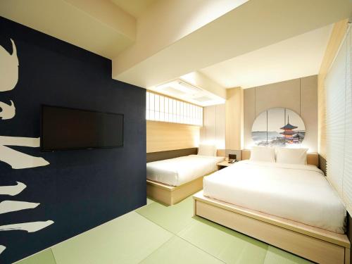 Habitación Triple del hotel Travelodge Kyoto Shijo Kawaramachi. Foto 3