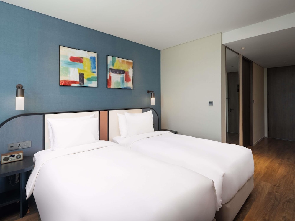 Habitación superior con 2 camas individuales del hotel Mercure Ambassador Seoul Magok
