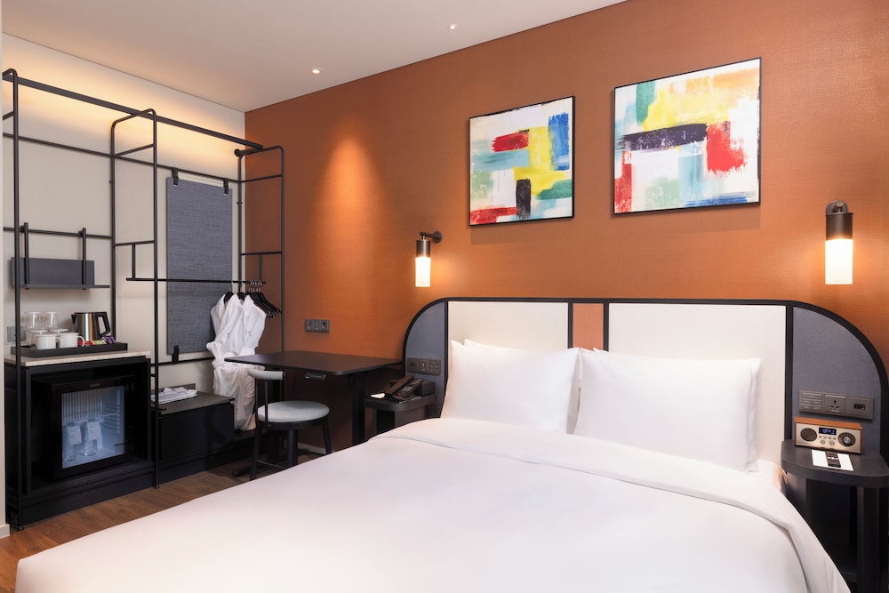 Habitación Superior con 1 cama individual del hotel Mercure Ambassador Seoul Magok. Foto 2