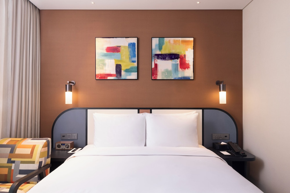 Habitación Superior con 1 cama individual del hotel Mercure Ambassador Seoul Magok. Foto 3