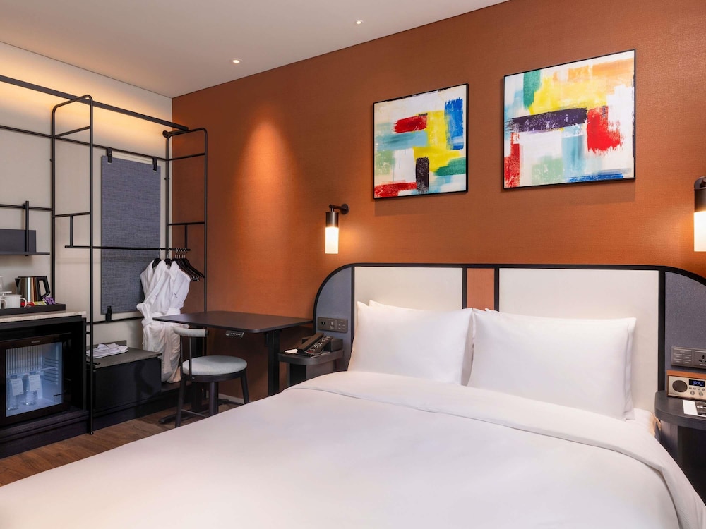 Habitación Superior con 1 cama queen size (Habitación Accesible) del hotel Mercure Ambassador Seoul Magok. Foto 7
