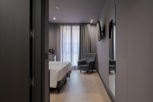 Habitación Doble Estándar del hotel LIVVO La Escarlata. Foto 10