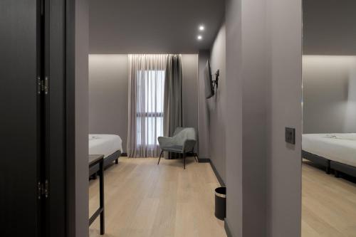 Habitación Doble Estándar del hotel LIVVO La Escarlata. Foto 13