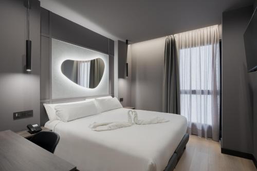 Habitación Doble Estándar del hotel LIVVO La Escarlata. Foto 16