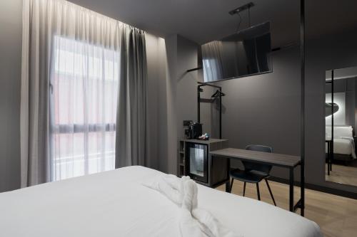 Habitación Doble Estándar del hotel LIVVO La Escarlata. Foto 19