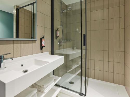 Estudio con 2 camas individuales del hotel Adagio London City East. Foto 1