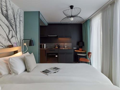 Estudio con 2 camas individuales del hotel Adagio London City East. Foto 3
