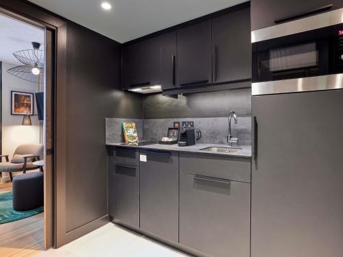 Estudio con cama doble del hotel Adagio London City East. Foto 8