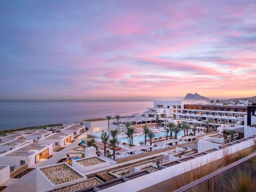 SUITE (370 m²): 3 dormitorios, vistas directas al mar, 3 camas, piscina, cocina y salón del hotel Fairmont La Hacienda Costa Del Sol. Foto 1