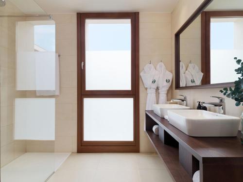 Habitación Doble Deluxe con vistas al jardín del hotel Gran Taoro. Foto 3