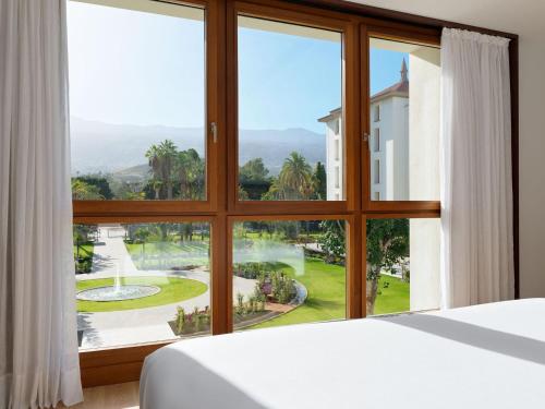 Suite Junior con vistas al jardín del hotel Gran Taoro. Foto 4