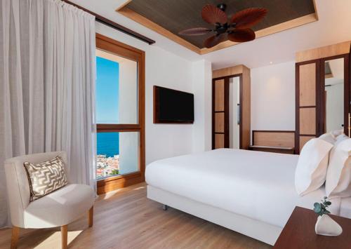 One - Bedroom Grand Suite Panoramic View del hotel Gran Taoro. Foto 6