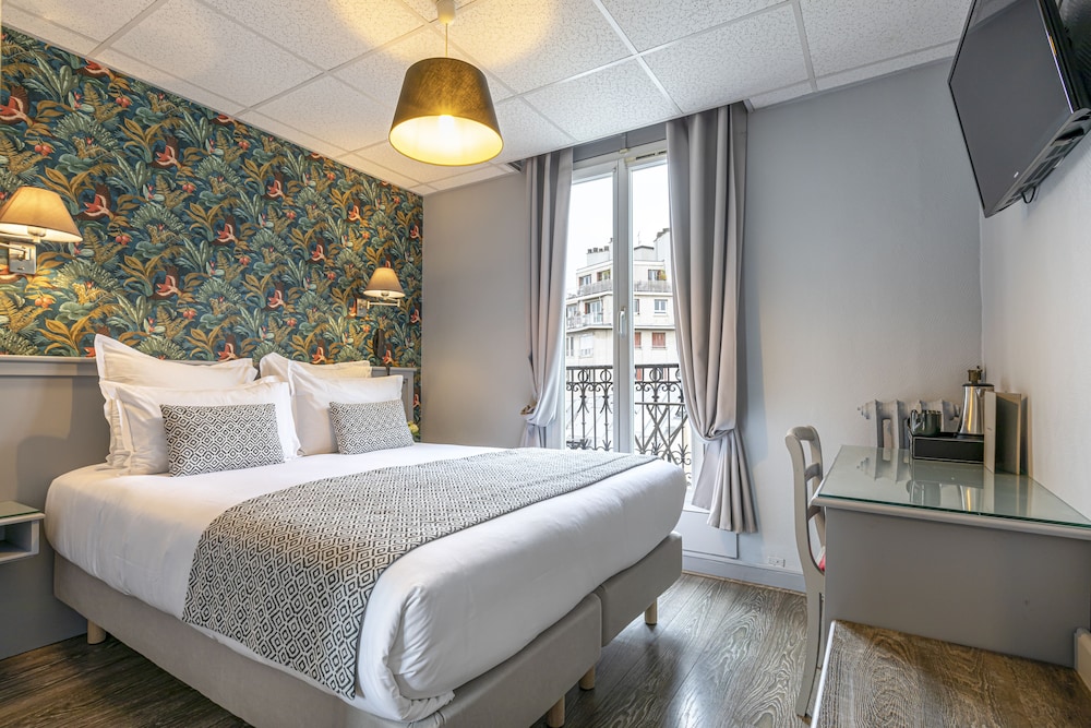 Habitación Doble con vistas a la Torre Eiffel del hotel Splendid. Foto 4