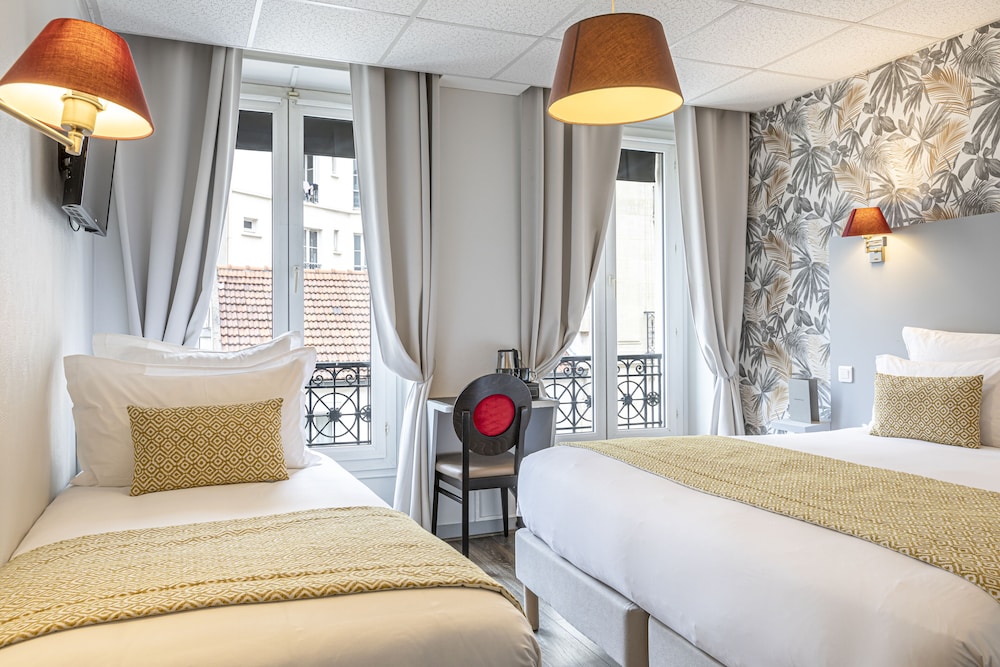 Habitación Triple con vistas a la Torre Eiffel del hotel Splendid. Foto 5