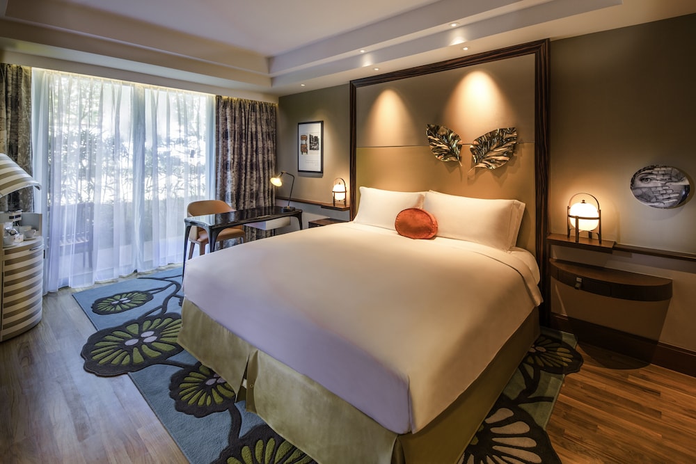 Habitación de Lujo con Vistas al Jardín, 1 Cama King Size del hotel Sofitel Singapore Sentosa Resort and Spa. Foto 1
