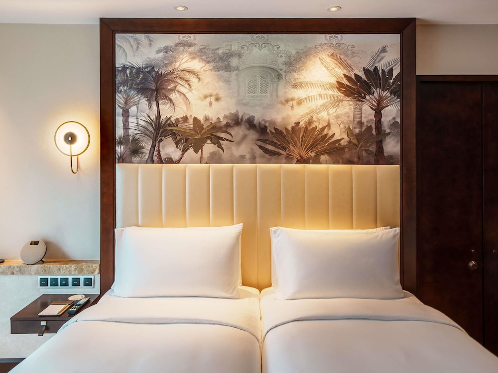 Habitación de Lujo con Vistas al Jardín, 2 Camas Individuales del hotel Sofitel Singapore Sentosa Resort and Spa. Foto 4