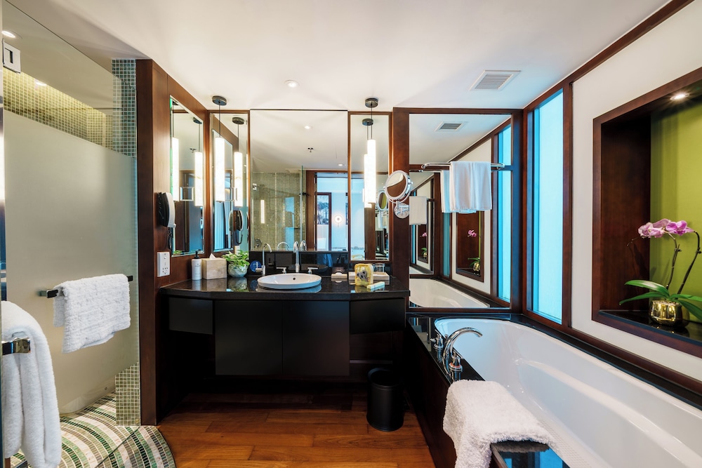 Habitación de Lujo con Vistas al Jardín, 2 Camas Individuales del hotel Sofitel Singapore Sentosa Resort and Spa. Foto 6