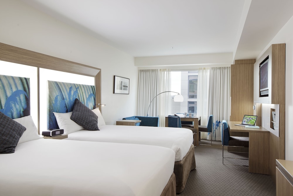 Habitación Superior con dos camas dobles del hotel Novotel Tainui Hamilton. Foto 1