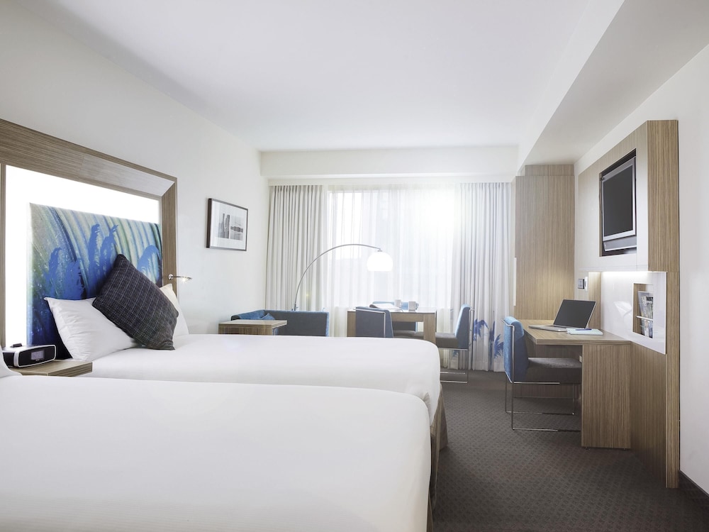 Habitación familiar superior con 2 camas dobles del hotel Novotel Tainui Hamilton