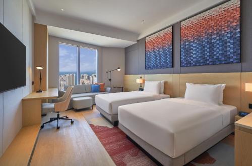 2 Camas Individuales, Vistas al Mar, Sofá Cama del hotel Hyatt Place Yantai Development Zone. Foto 3