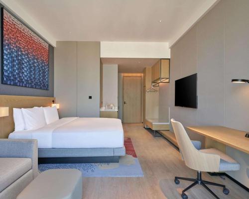 1 Cama King, Vistas al Mar, Sofá Cama del hotel Hyatt Place Yantai Development Zone. Foto 1