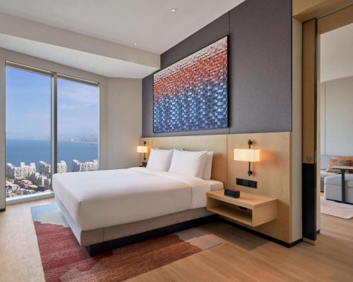 Suite Familiar, 1 Cama King, Vistas al Mar del hotel Hyatt Place Yantai Development Zone. Foto 1